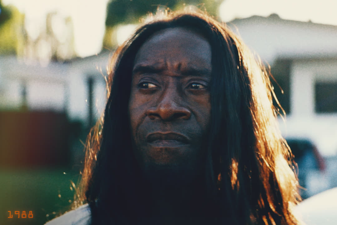 Moody close-up teaser still of Mo, dated 1988