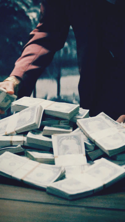 Counting cash, premiere day stunt