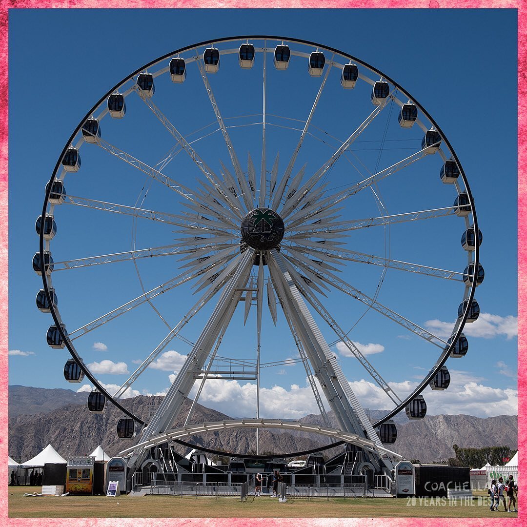 The Coachella Ferris wheel against a blue sky in the documentary's pink frame