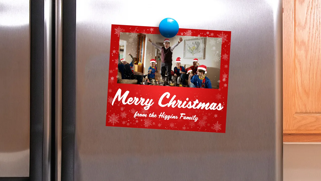 Higgins family Christmas card on a fridge